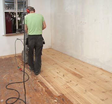 Laitteen kääntäminen puulattian hionta